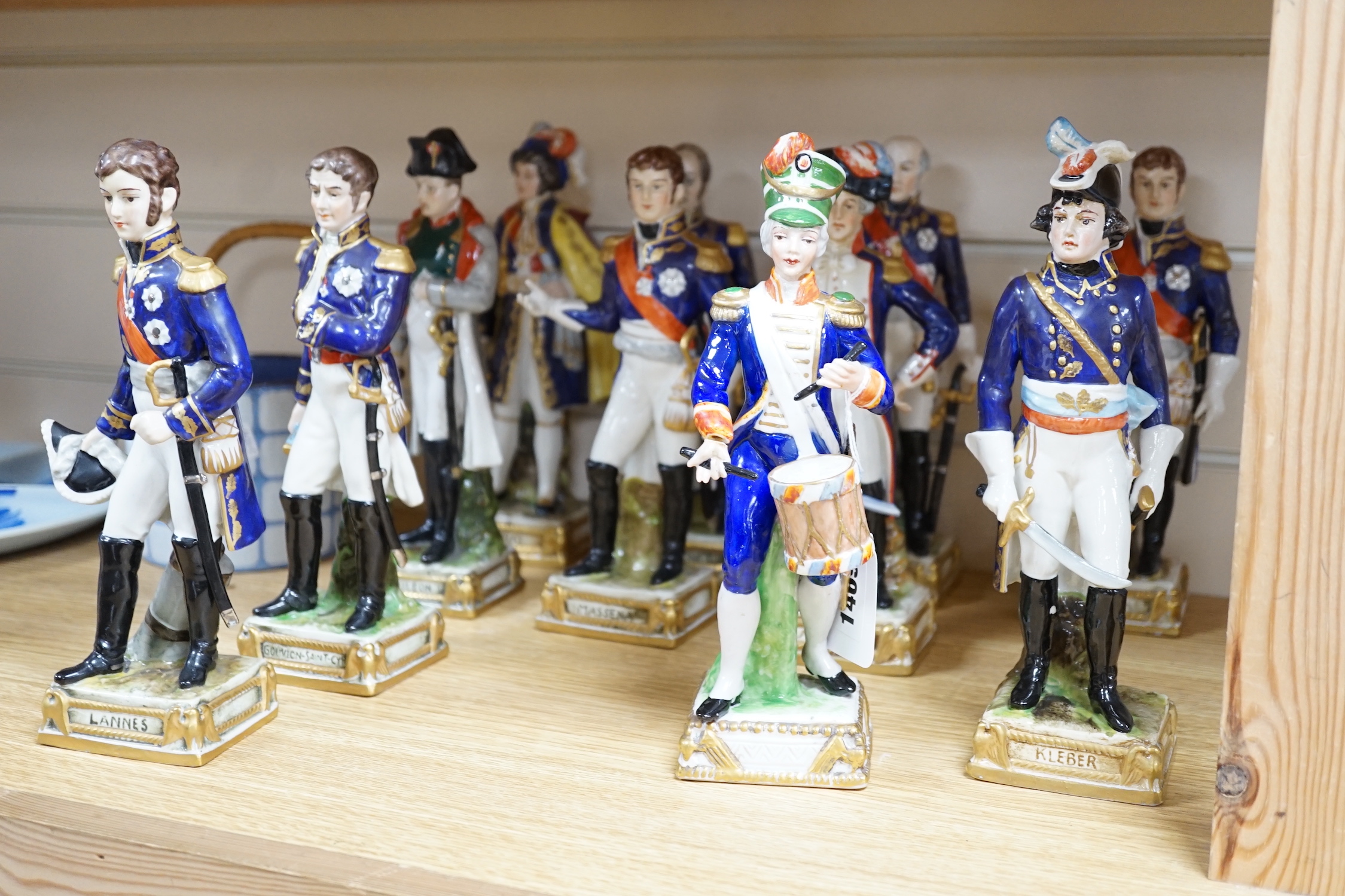A group of fifteen named German porcelain military figures, tallest La Fayette 24cm high